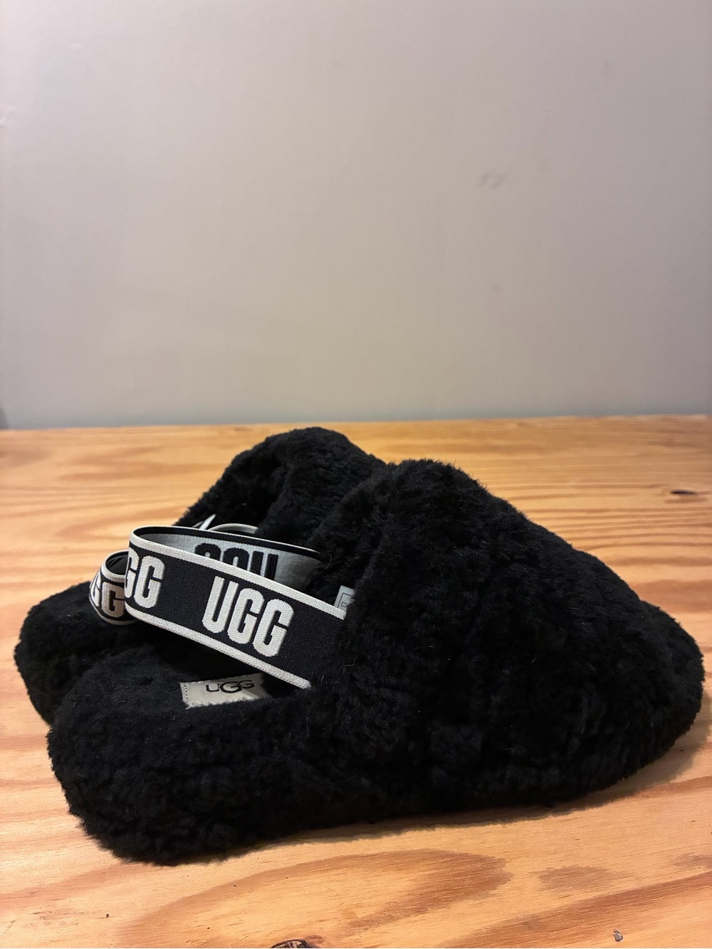 UGG Black Faux Shearling Slide with Branded Heel Strap